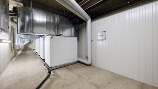 Coopérative d’habitation de Fiesch (VS): de la chaudière à mazout à la pompe à chaleur. Le chauffage à mazout existant a été remplacé par un système moderne.